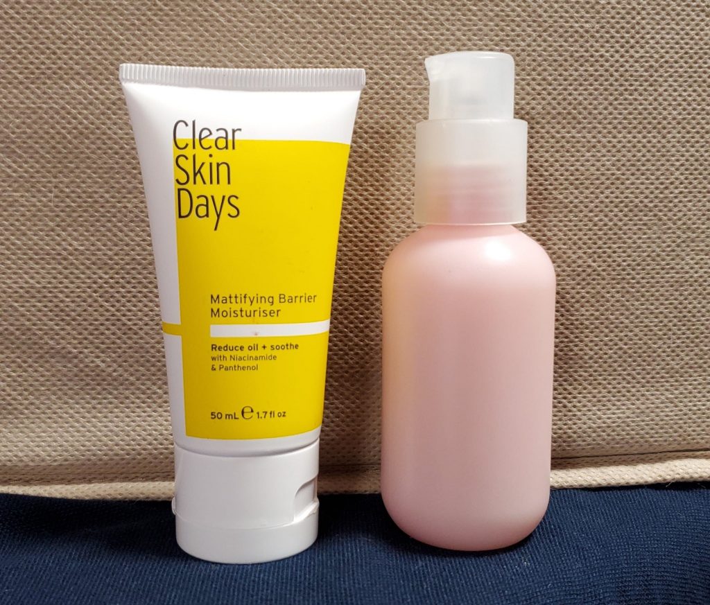Clear Skin Days Coconut-free Moisturizer bottle next to recycled pump bottle